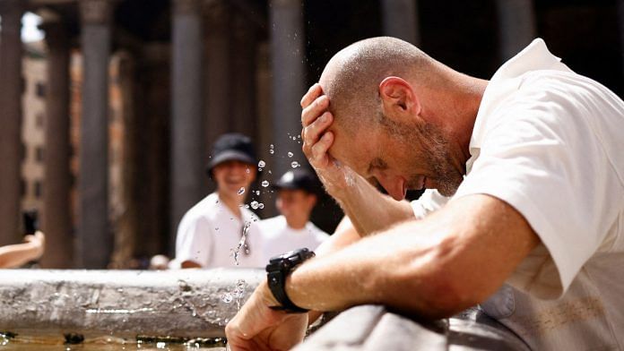 Roberto Klarich from Canada cools off at a fountain near the Pantheon, after giving up queuing to enter because it is too hot and the queue is too long, during a heatwave across Italy as temperatures are expected to cool off in the Italian capital, in Rome, Italy | Reuters