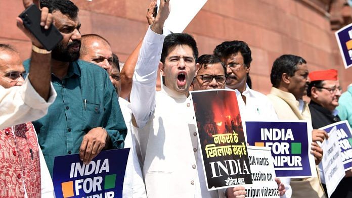 Opposition parties (I.N.D.I.A) alliance MPs including Raghav Chadha and others protest at the premises of Parliament, demanding PM Modi's statement on Manipur ethnic violence in both houses, during the ongoing Monsoon Session, in New Delhi on Monday | ANI