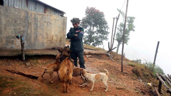 SoO member playing with the dogs at his designated camp | Praveen Jain | ThePrint