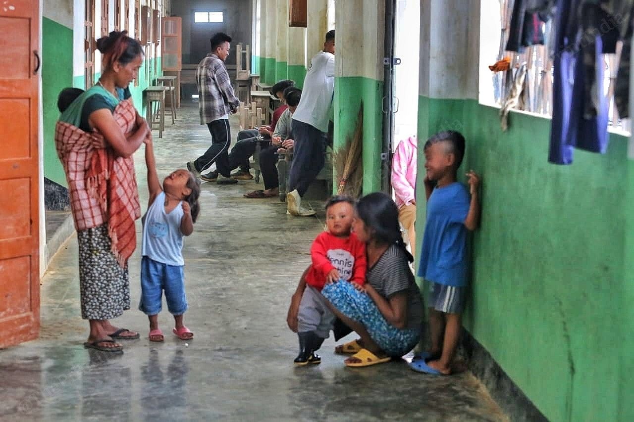 Everybody in the shelter try to lighten the mood. They talk and shelter Photo: Praveen Jain | ThePrint