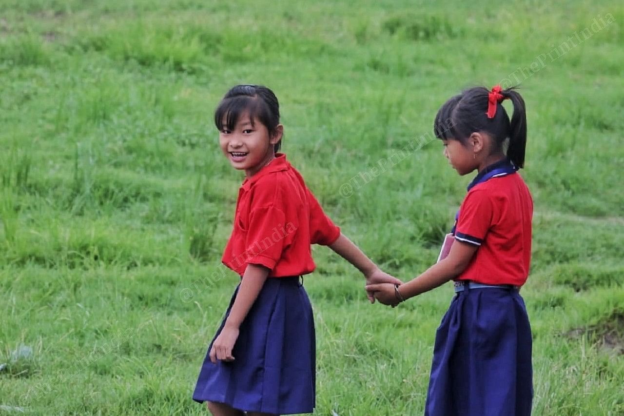 Naroem student from Imphal ( left) and Thoibi from Moreh playing together in the school | Photo: Praveen Jain | ThePrint