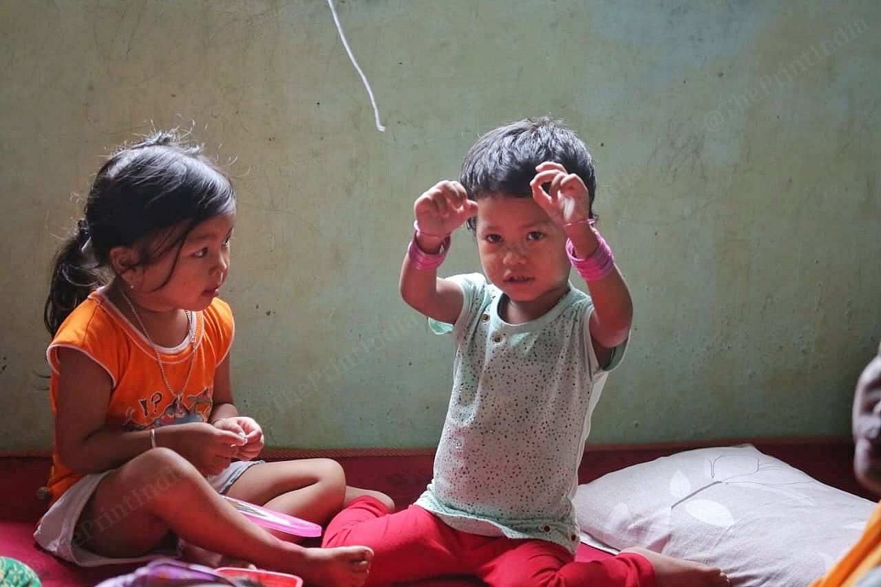 At Churachandpur camp, a toddler shows off bangles | Photo: Praveen Jain | ThePrint