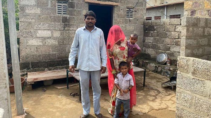 Pakistani Hindu migrant Bheluram with his wife and two children outside their home in Barmer | Nootan Sharma | ThePrint