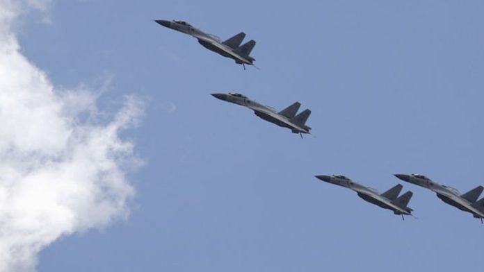 J-11B fighter jets of the Chinese Air Force fly in formation during a training session for the upcoming parade marking the 70th anniversary of the end of World War Two, on the outskirts of Beijing, July 2, 2015 | Reuters