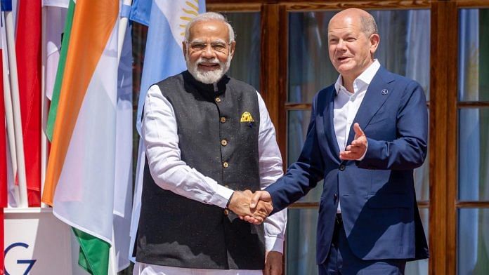 File photo of German Chancellor Olaf Scholz and PM Narendra Modi | ANI