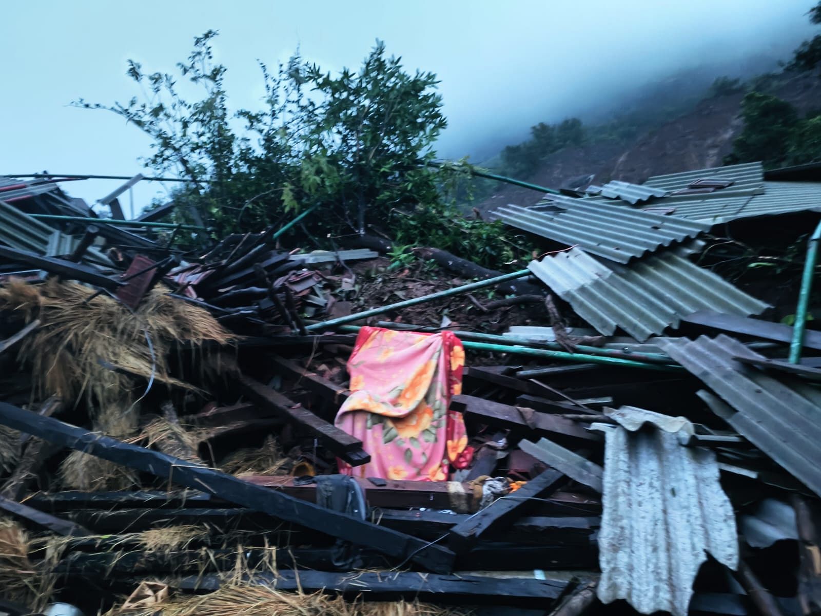 Houses flattened by a landslide at Irshalwadi village in Raigad, Maharashtra | Photo: NDRF 