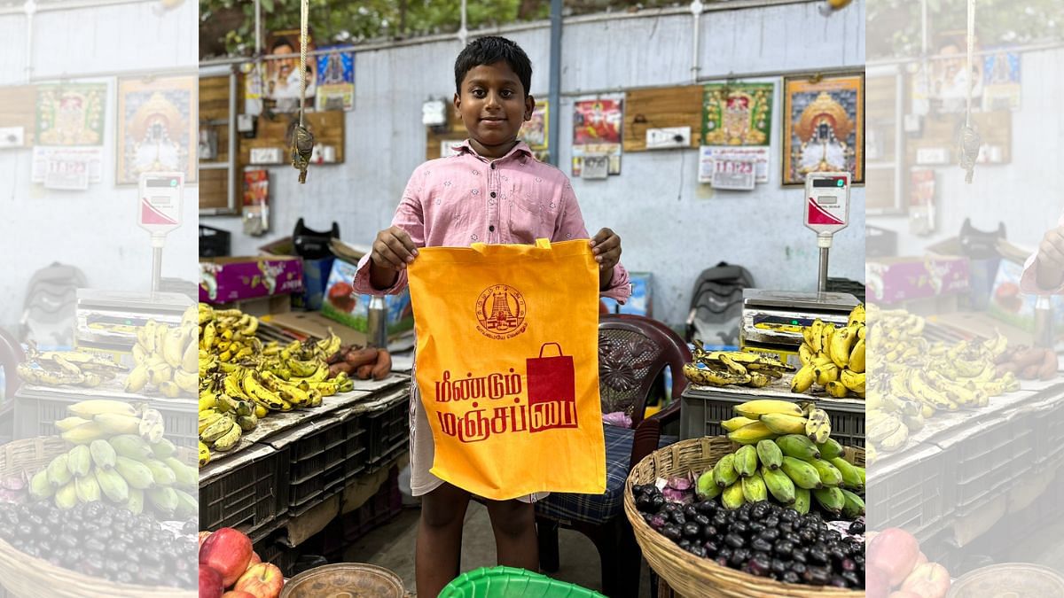 A child at Chennai’s Kodambakkam fruit and vegetable market holds up a ‘manjapai’ | Photo: Twitter, @supriyasahuias