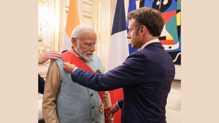 French President Emmanuel Macron bestowed the Grand Cross of the Legion of Honor on PM Narendra Modi | Twitter/@ANI