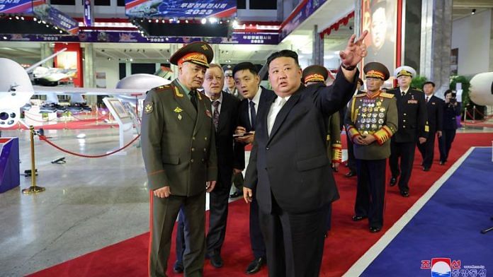 North Korean leader Kim Jong Un and Russia's Defense Minister Sergei Shoigu visit an exhibition of armed equipment on the occasion of the 70th anniversary of the Korean War armistice in this image released by North Korea's Korean Central News Agency on July 27, 2023/Reuters
