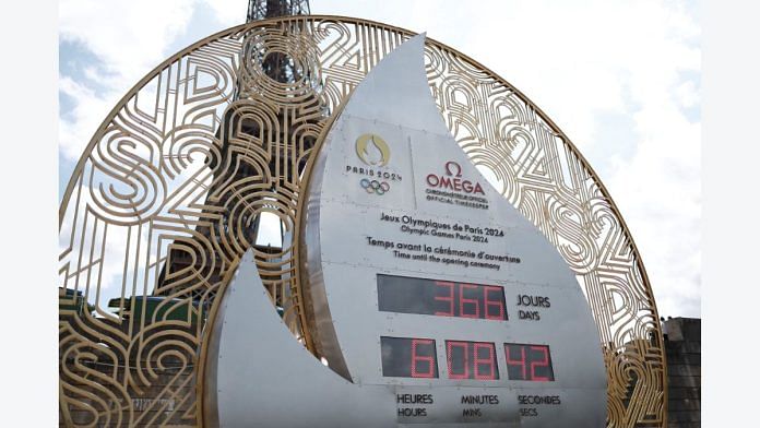 The countdown clock showing 366 days, one year to go until the Paris 2024 Olympic Games opening ceremony, is seen near the Eiffel Tower in Paris, France, | Reuters