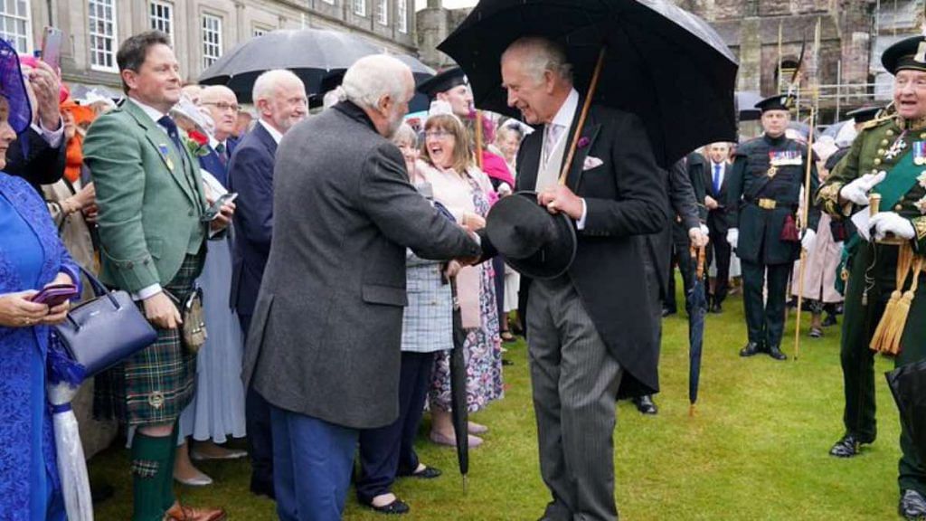 King Charles III greets guests during a Garden Party at the Palace of Holyroodhouse in Edinburgh, Scotland, Britain, as part of the first Holyrood Week since the King's coronation. Picture date: Tuesday July 4, 2023 | Reuters