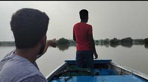 Shubhankar from Ojaswini foundation on a rescue operation on an NDRF-provided boat | Shubhangi Misra | ThePrint