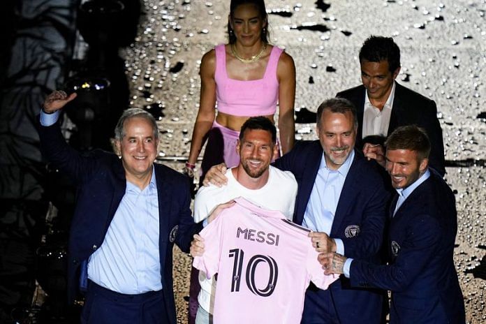 Inter Miami CF forward Lionel Messi is introduced at an event with managing owner Jorge Mas, co-owners Jose Mas & David Beckham | Mandatory Credit: Rich Storry-USA TODAY Sports via Reuters