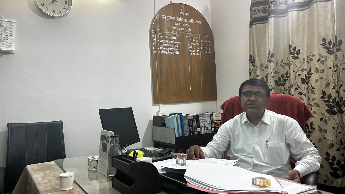 The current prosecution lawyer Virender Rathod in his office | Jyoti Yadav, ThePrint
