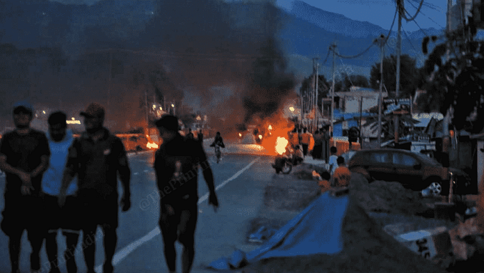 File photo of a car burning in the aftermath of clashes at NH 102 between Imphal and Moreh | Praveen Jain | ThePrint