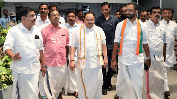 File photo of BJP national president J.P. Nadda with Kerala BJP chief K. Surendran (with scarf in party colours) | ANI Photo)