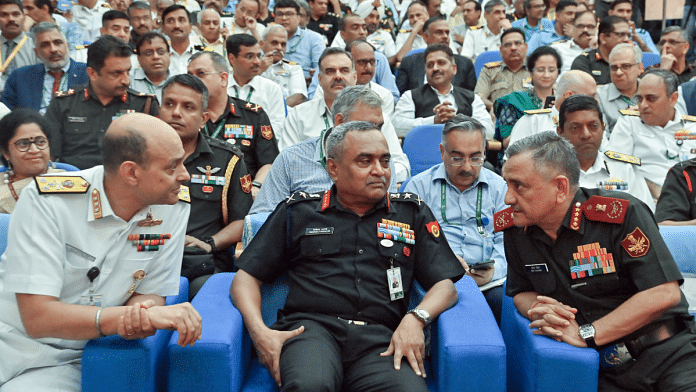 File photo of Navy vice-chief Vice Admiral Sanjay Jasjit Singh, Army chief General Manoj Pande and Chief of Defence Staff General Anil Chauhan at a meeting | ANI
