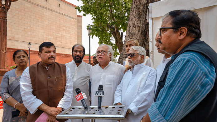 Opposition MPs Sanjay Singh, Jairam Ramesh, Tiruchi Siva, Manoj Kumar Jha and others address the media at the Parliament complex on the first day of the Monsoon session in New Delhi | PTI