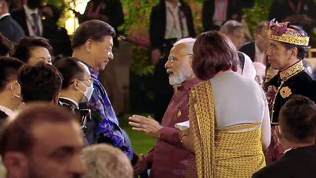 Prime Minister Narendra Modi shaking hands with Chinese President Xi Jinping at the welcome dinner of the G20 summit in Bali in November 2022 | ANI