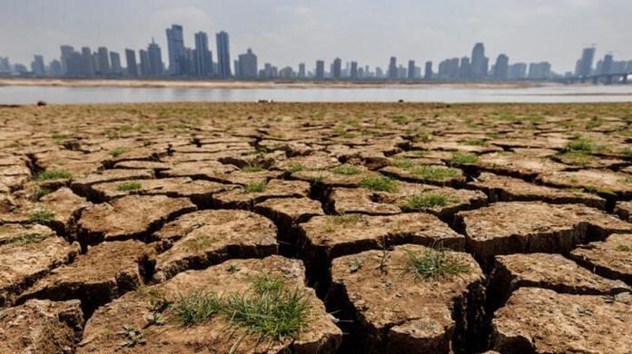 Cracks run through the partially dried-up river bed of the Gan River in Nanchang, Jiangxi province, China | Reuters file photo