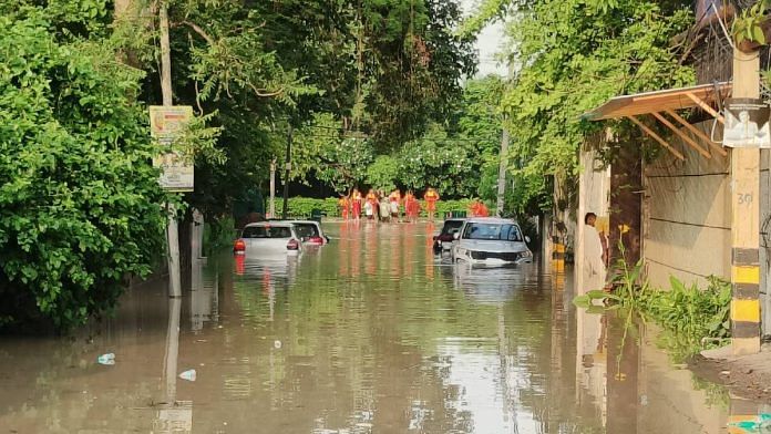 Cars submerged in the flood waters in Delhi's Civil Lines | Photo: Devansh Mittal | ThePrint