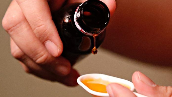 File photo of cough syrup medication being poured | Reuters