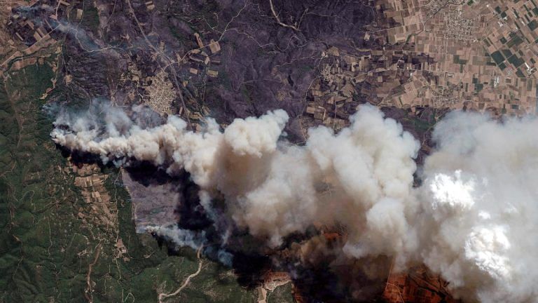 Wildfire rages near Athens for second day, forcing more evacuations