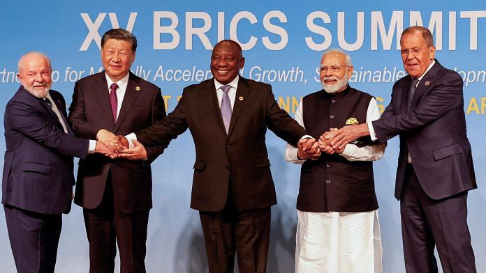President of Brazil Luiz Inacio Lula da Silva, President of China Xi Jinping, South African President Cyril Ramaphosa, Prime Minister of India Narendra Modi and Russia's Foreign Minister Sergei Lavrov pose for a BRICS family photo during the 2023 BRICS Summit at the Sandton Convention Centre in Johannesburg, South Africa, on August 23, 2023 | Reuters