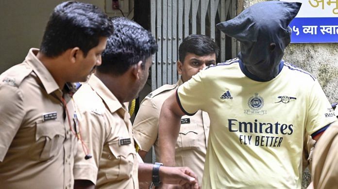 RPF constable Chetan Singh is escorted to a court in Mumbai Tuesday | ANI