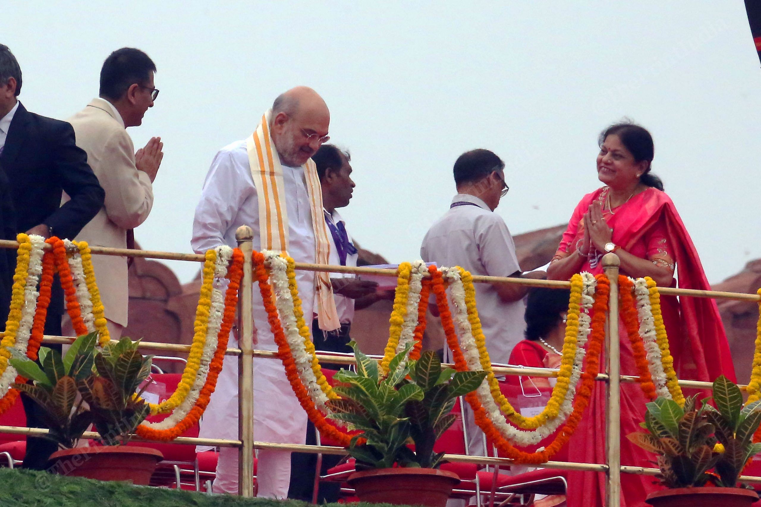 CJI Dhananjaya Yeshwant Chandrachud greets Home Minister Amit Shah and his wife Sonal Shah during the 77th Independence Day at Red Fort | Photo: Praveen Jain | ThePrint