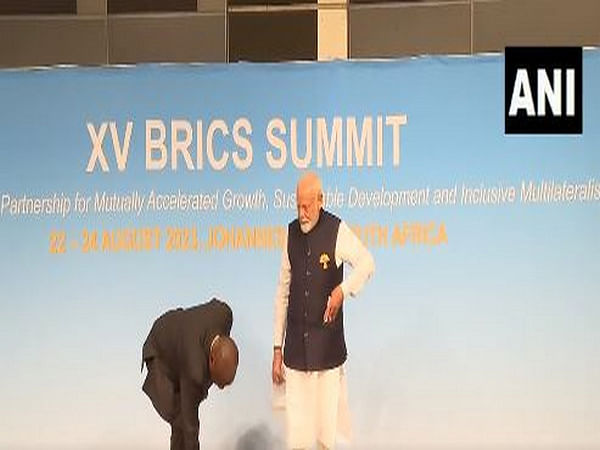 At BRICS Summit, PM Modi notices Tricolour on ground, picks it up; SA President Ramaphosa follows suit