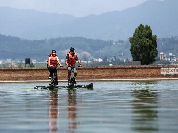 “Water bike” craze drives tourists to ancient city of Bhaktapur in Nepal