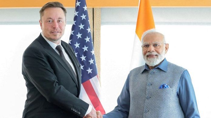 Prime Minister Narendra Modi shakes hand with Tesla chief executive Elon Musk during their meeting in New York City, New York, U.S., June 20, 2023 | Reuters