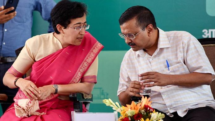 File image of Delhi Finance & Services Minister Atishi with Chief Minister Arvind Kejriwal | ANI