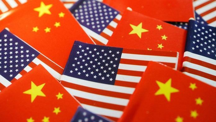 Flags of U.S. and China are seen in this illustration picture taken August 2, 2022 | Reuters
