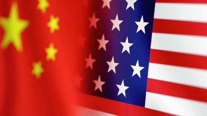 U.S. and Chinese flags are seen in this illustration taken Jan. 30, 2023 | Reuters