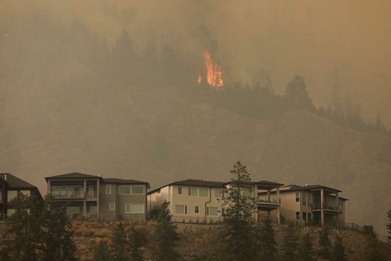 Cooler conditions bring some hope as Canada wildfires rage on