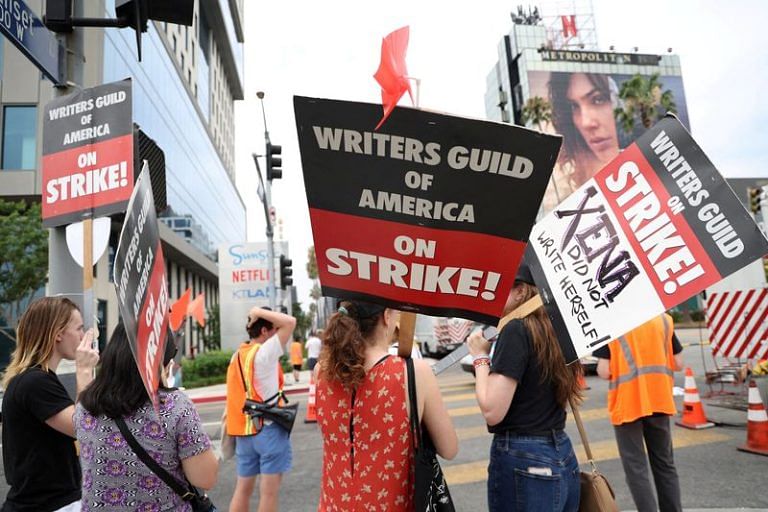 Hollywood studios offer new concessions to striking screenwriters, reports Bloomberg News