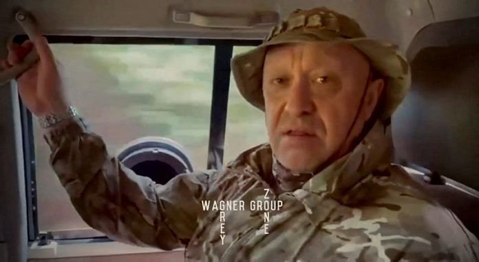 Russian mercenary boss Yevgeny Prigozhin gives an address in camouflage inside a vehicle in this still image taken from video possibly shot in Africa | Courtesy Grey Zone/Telegram via Reuters