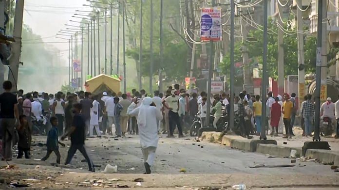 A clash erupts between two groups in Haryana's Nuh, on 31 July 2023 | ANI photo