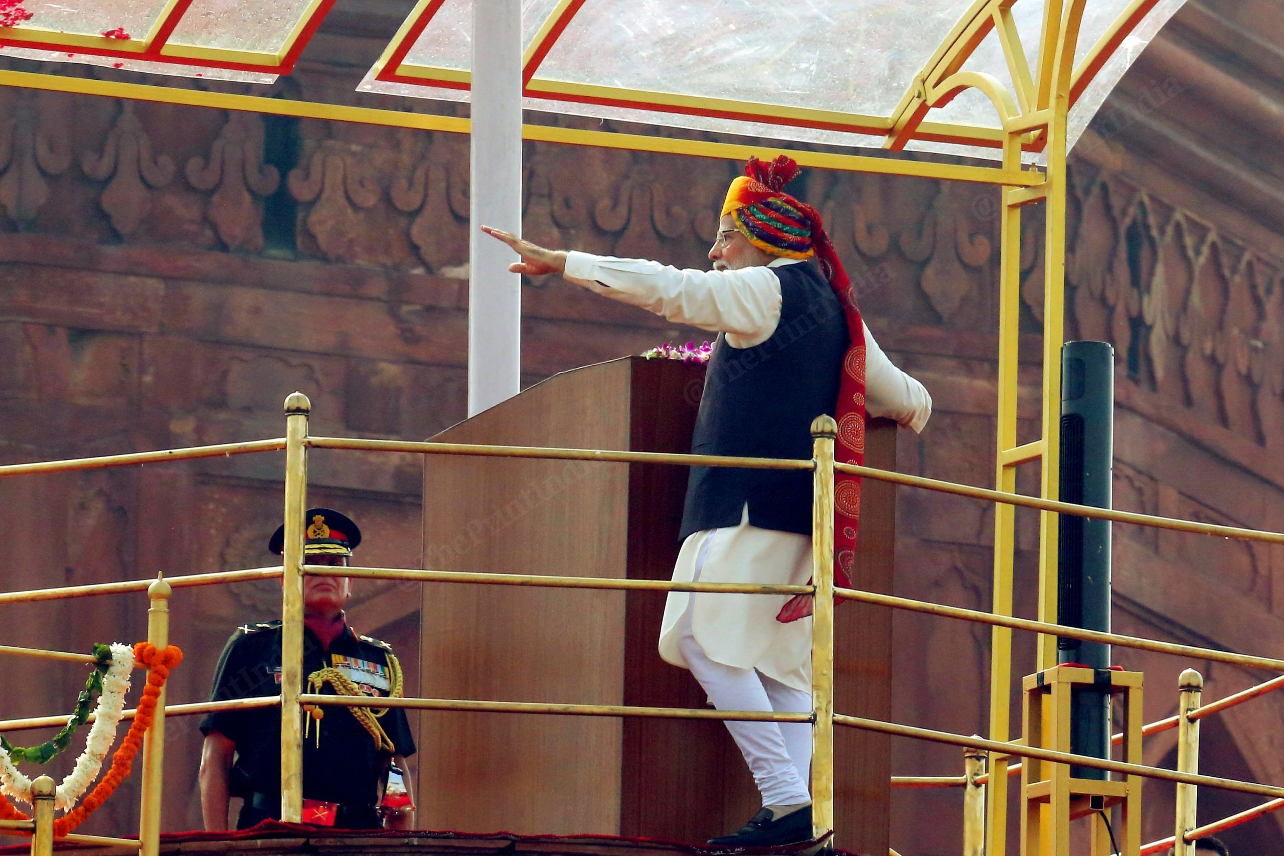 Prime Minister Narendra Modi waves from the rampart of Red Fort before addressing the nation | Photo: Praveen Jain | ThePrint