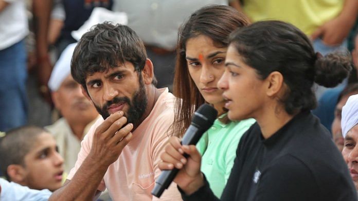 File photo of wrestlers Bajrang Punia, Vinesh Phogat and Sakshee Malikkh at Jantar Mantar | Suraj Singh Bisht | ThePrint