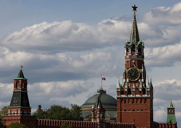 The Russian flag flies on the dome of the Kremlin Senate building behind Spasskaya Tower, in central Moscow | Reuters file photo