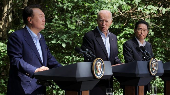 US President Joe Biden holds a joint press conference with Japanese PM Fumio Kishida and South Korean President Yoon Suk Yeol during the trilateral summit at Camp David near Thurmont, Maryland, US, on 18 August 2023 | Reuters