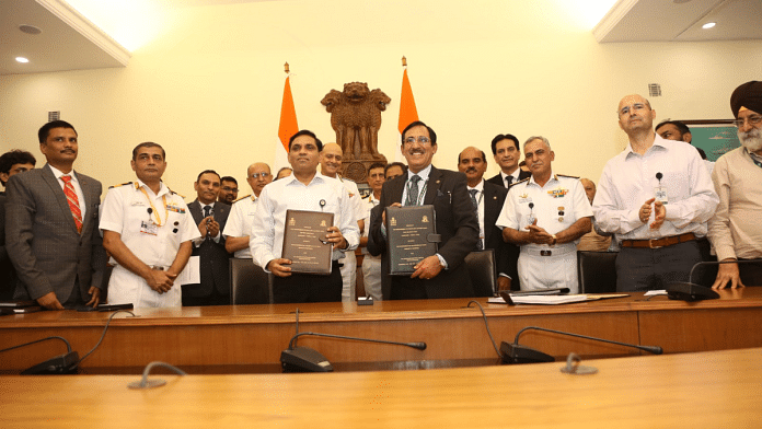 Officials from Ministry of Defence, Indian Navy and Hindustan Shipyard Limited after signing of the Rs 19,000 crore deal in New Delhi | Twitter | @CMD_HSL