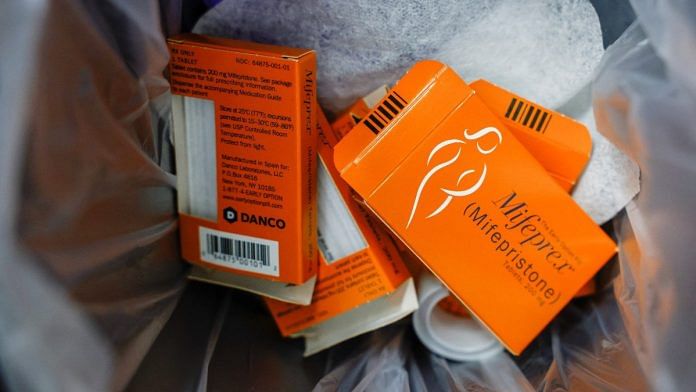 Used boxes of Mifepristone, the first pill in a medical abortion, line a trash can at Alamo Women's Clinic in Carbondale, Illinois, US | Reuters