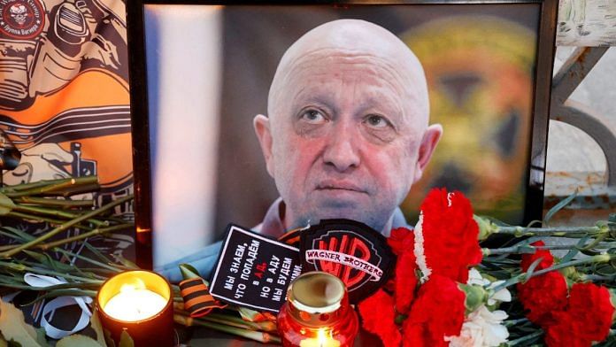 A view shows a portrait of Wagner mercenary chief Yevgeny Prigozhin at a makeshift memorial in Moscow, Russia | Reuters
