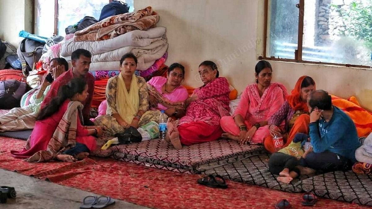 Krishna Nagar residents who were evacuated after the 15 August landslide, at Ambedkar Bhawan in Shimla | Praveen Jain | ThePrint