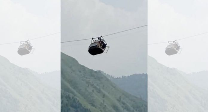 A view shows cable car carrying students stranded mid-air in Battagram, Pakistan, 22 August 2023, in this screen grab obtained from social media video | Umeed Sahar/via Reuters