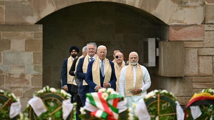 U.S. President Joe Biden visits Raj Ghat memorial with Prime Minister of India Narendra Modi and other G20 leaders | Reuters